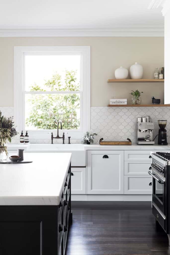 white kitchen with floating shelves