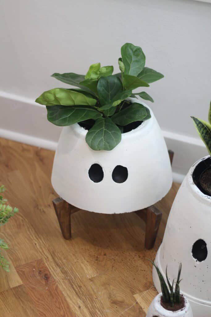 ghost planter on wood legs