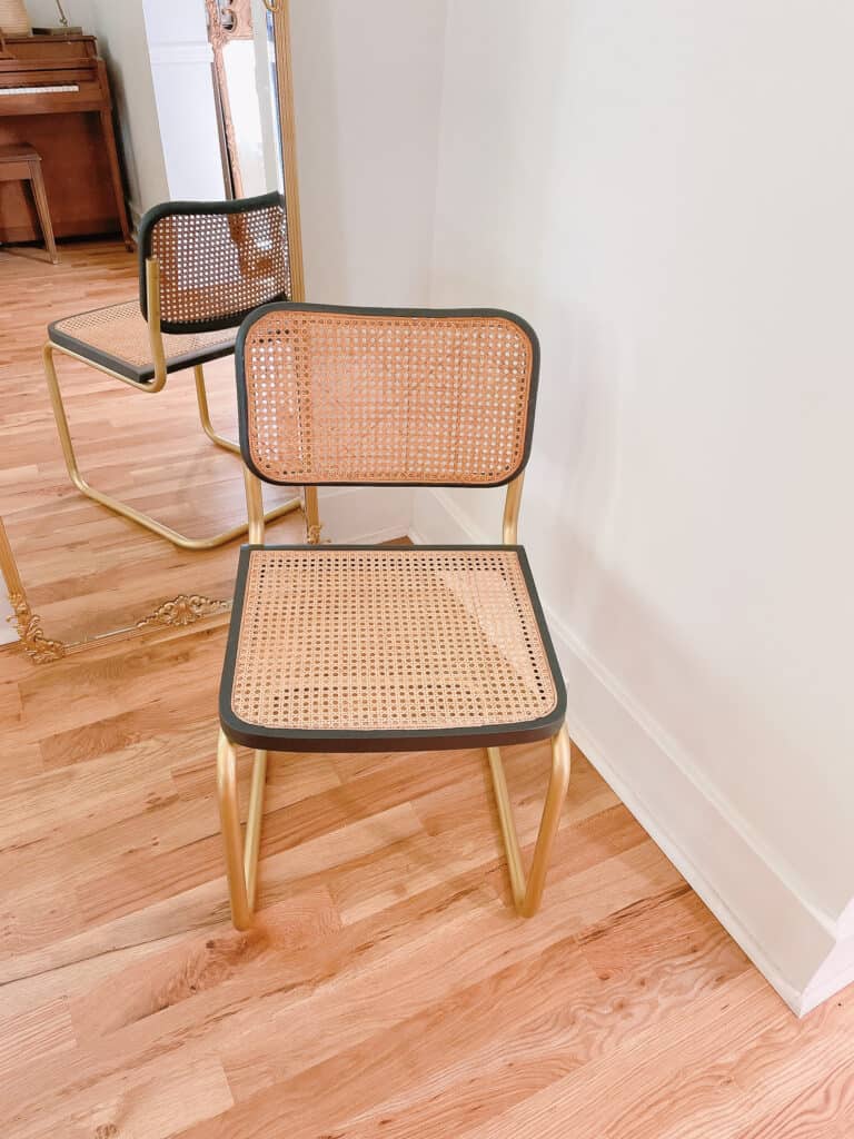 Gold and black cane dining chair 