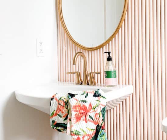 Pink bathroom with Pedestal Sink