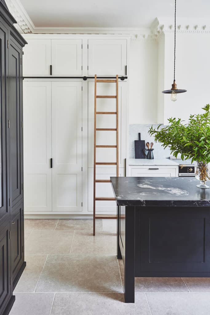 two toned kitchen with ladder