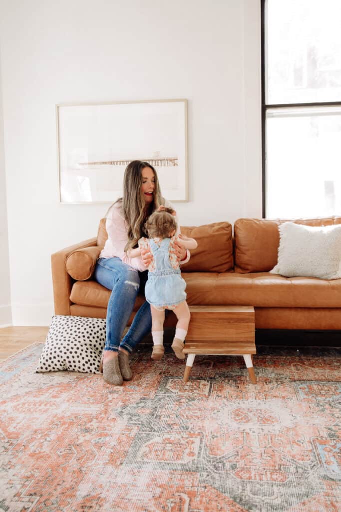 mom and baby on Poly and bark napa sofa 