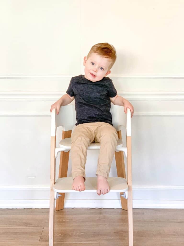 little boy in high chair