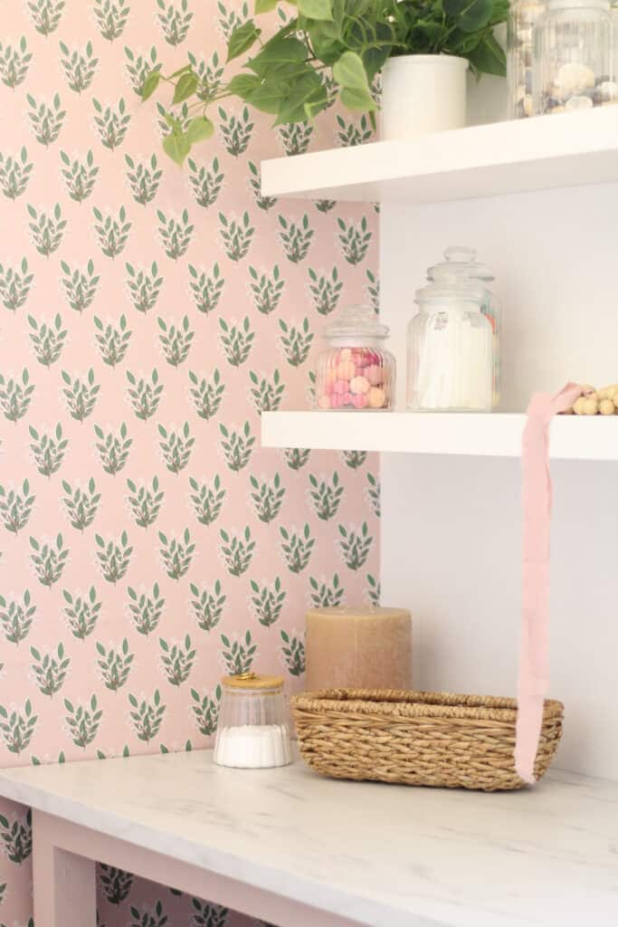 white floating shelves in craft room 