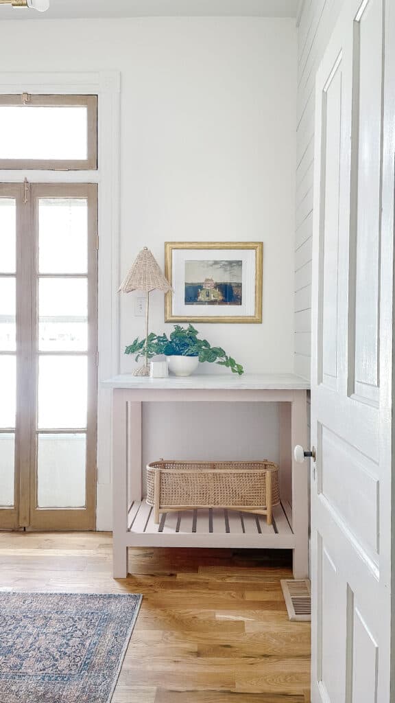 blush pink work benches in small home office space