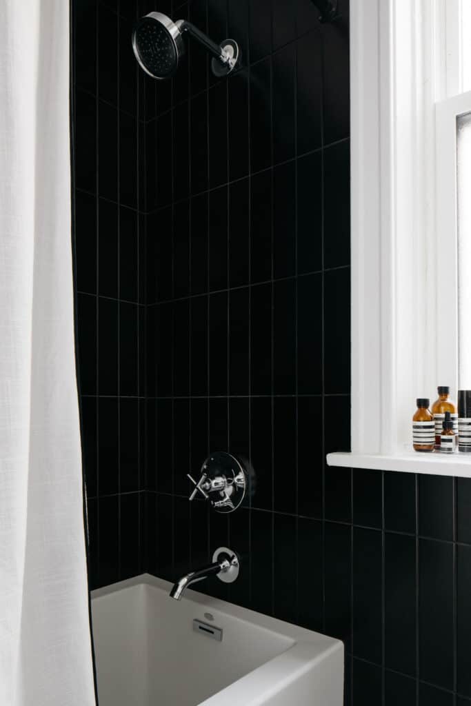 ceramic tile in black and white bathroom