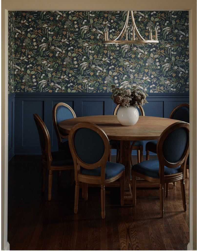 moody paint and wallpapered dining room