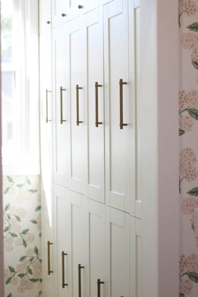 Klearvue cabinetry can have a customized appearance with this brass hardware in this small Butler's Pantry.