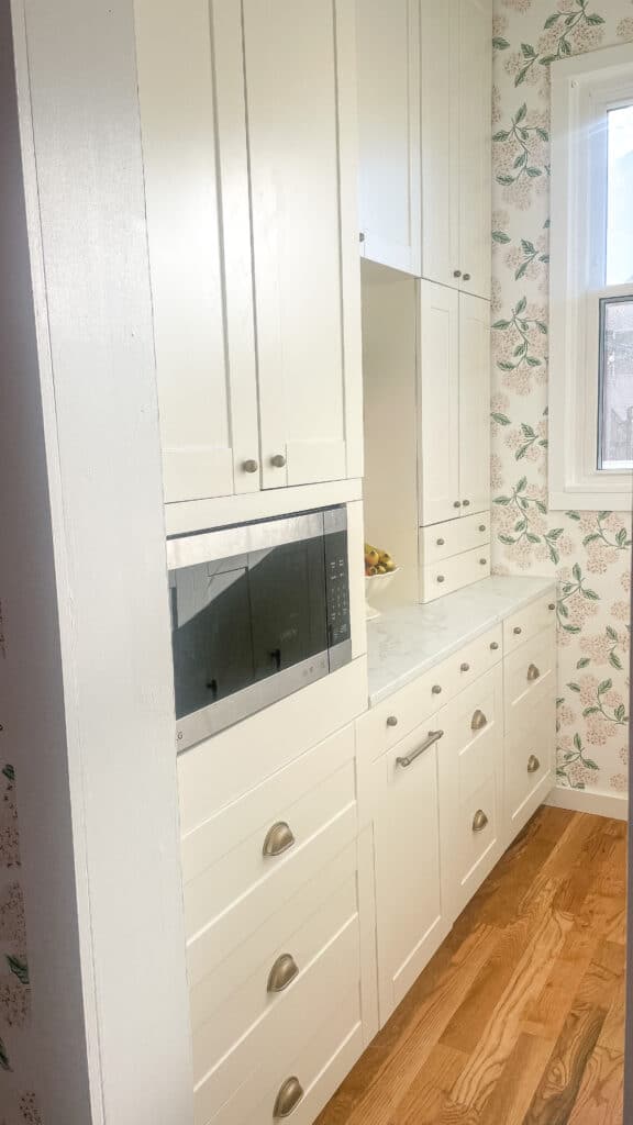 This small butler's pantry was designed with Klearvue Cabinetry for a custom built in appearance. The Klearvue cabinetry can be arranged in different configurations to include a built-in microwave, hidden appliance garages, and pull out trash bins.