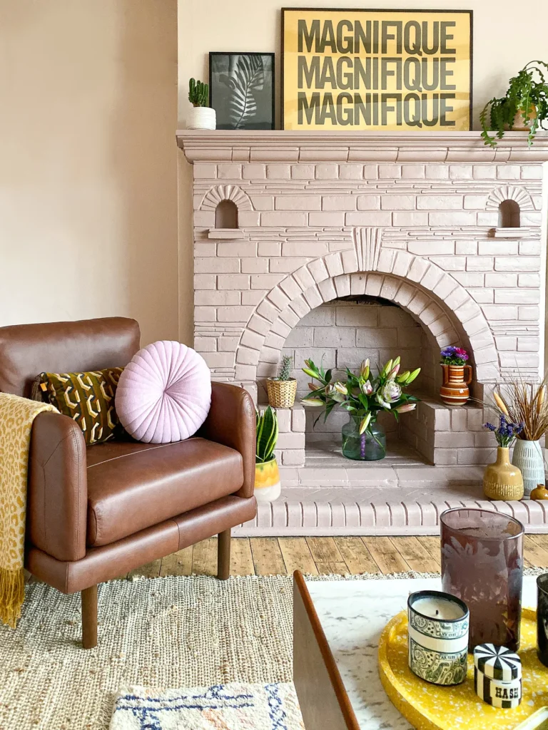Painting Stone Fireplace Ideas with a light pink and modern painted fireplace