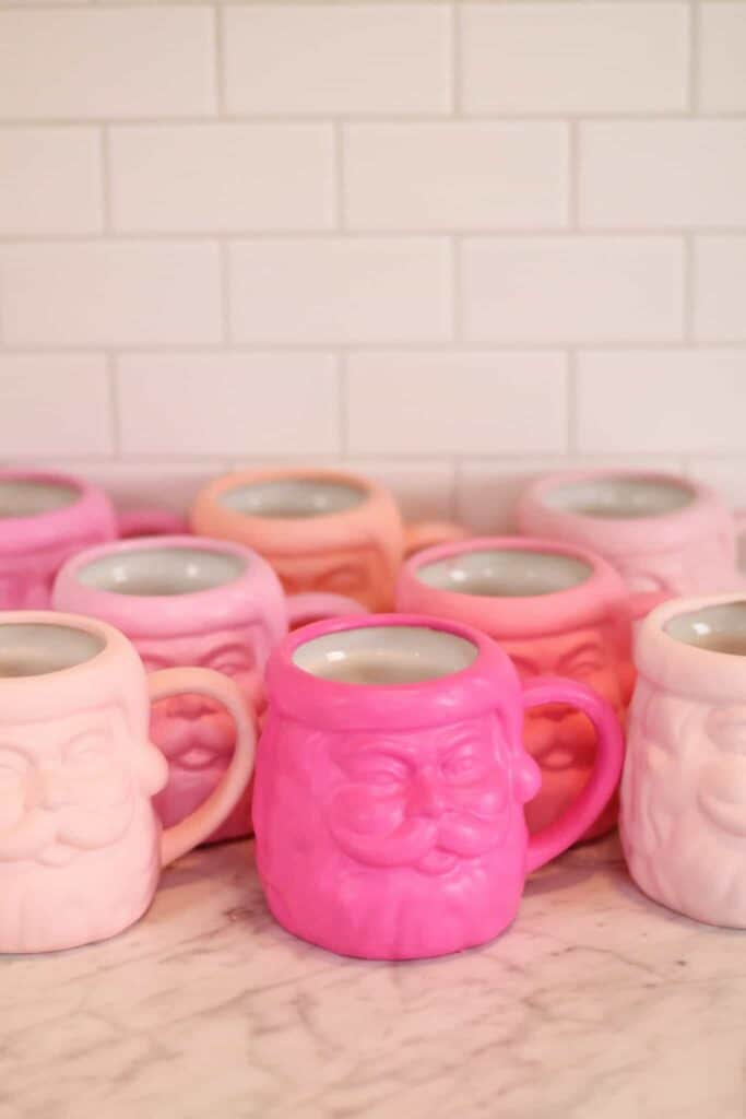 10 Christmas DIYs You'll Love-DIY pink Santa coffee mugs