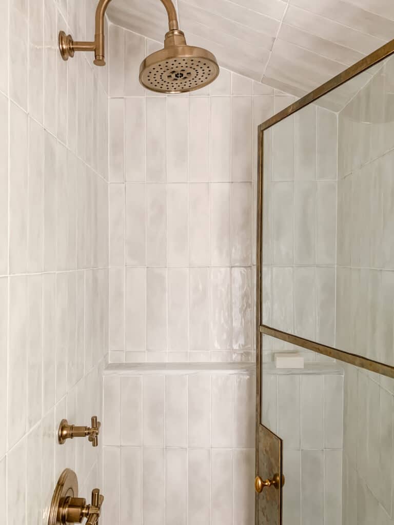Shower Tile Trim Ideas with Aged Brass Details