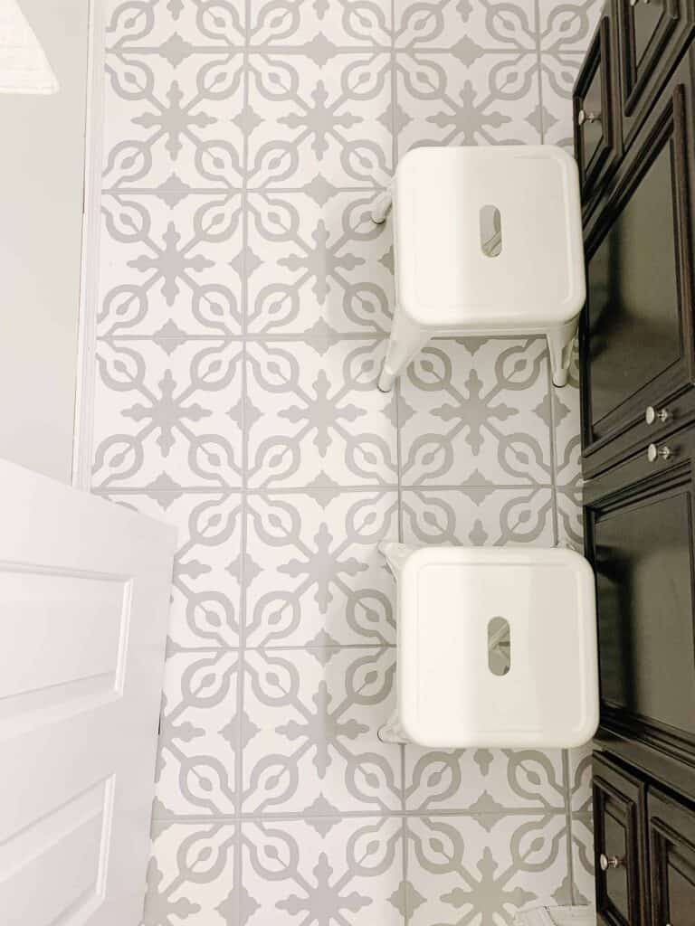 Stenciled DIY painted tile floors.