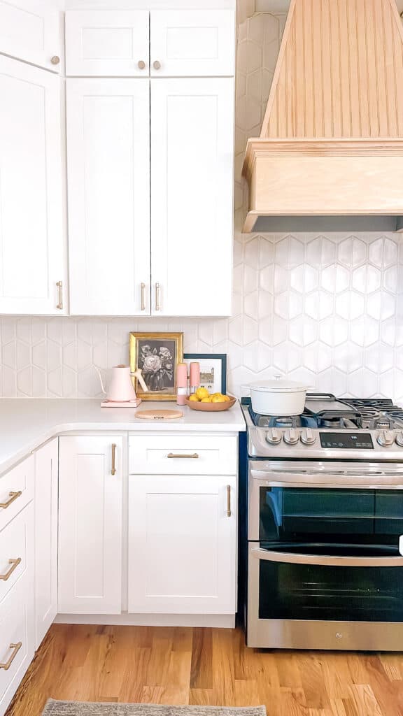 White kitchen corner with stove.