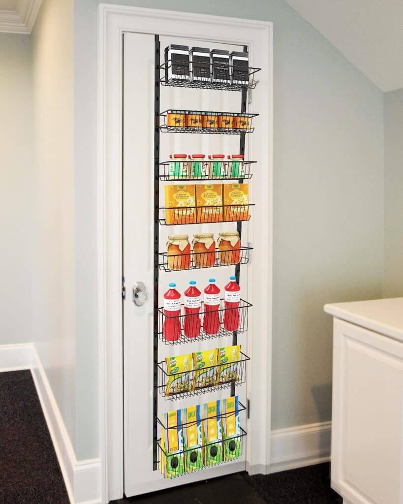 Over the door pantry organizer can help organize water bottles.