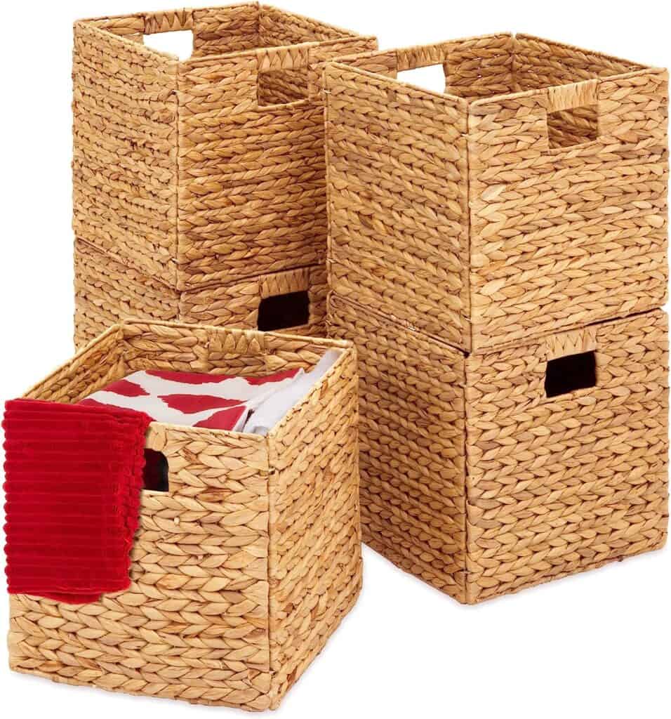 Wicker basket for water bottle storage.