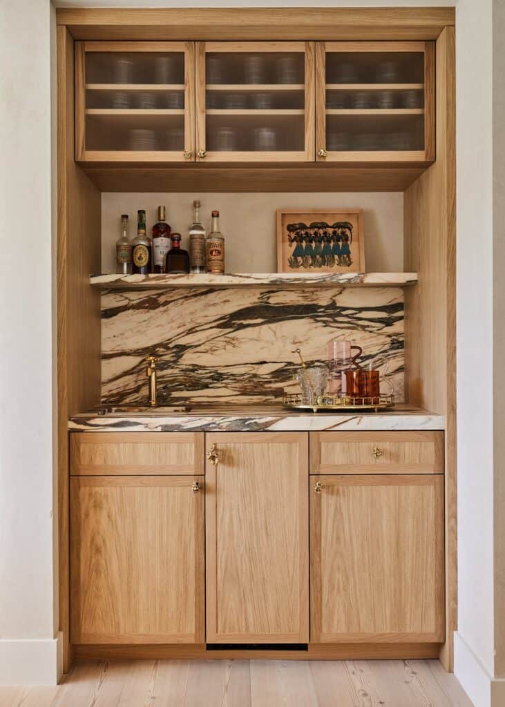 Built in natural wood bar with marble.