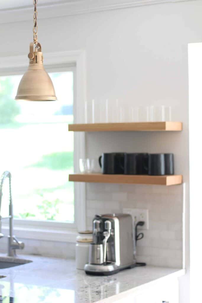 Kitchen with floating shelves.