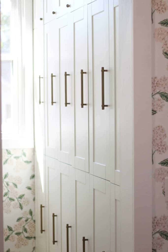 Close up of white cabinets and hardware pulls.