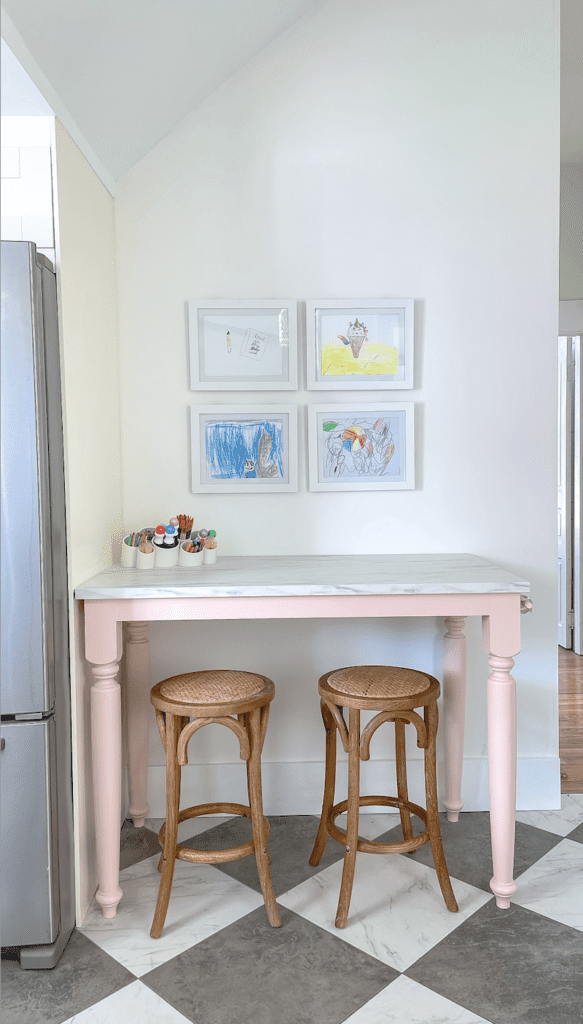 DIY art table with art frames that can be easily changed out for your own art.