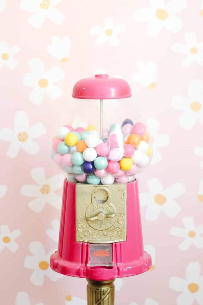 You can easily swap out decor like this pink gumball dispenser for your toddler girl bedroom on a budget.