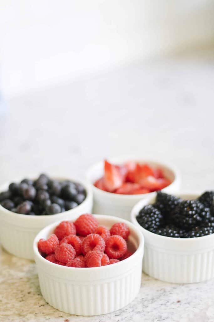 Berries in white cups, red white and blue.