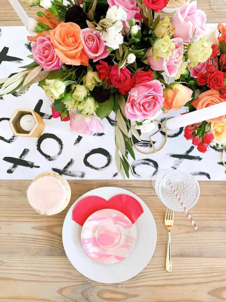 Everyday table centerpiece ideas can also be themed for various holidays with this Valentine's day table runner.