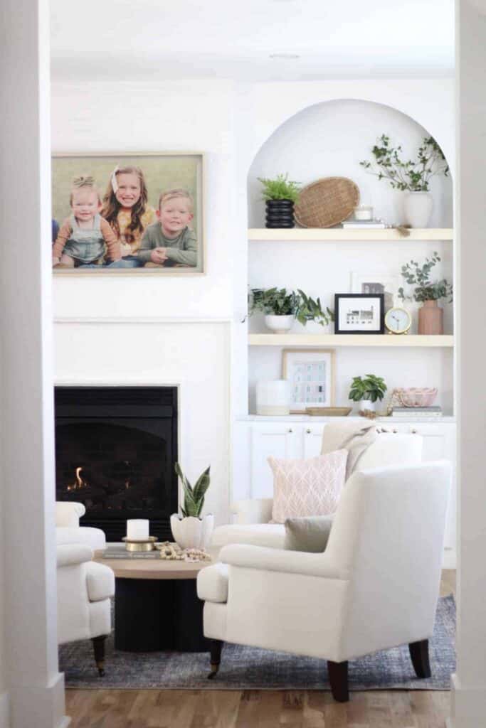 Everyday table centerpiece ideas can also apply to coffee table with this faux plant, candle ,and decorative beads.