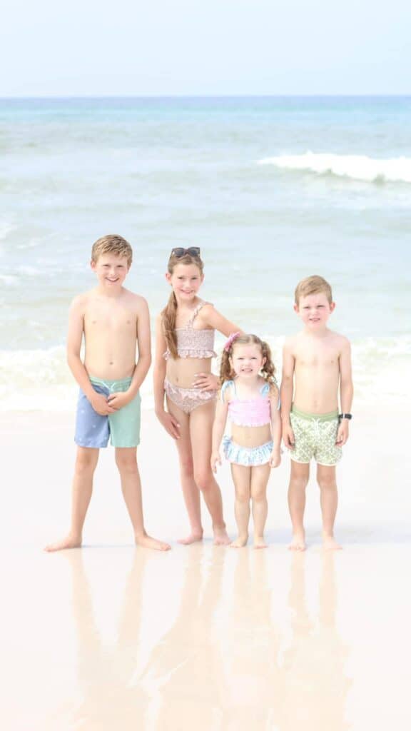 Four kids on a beach