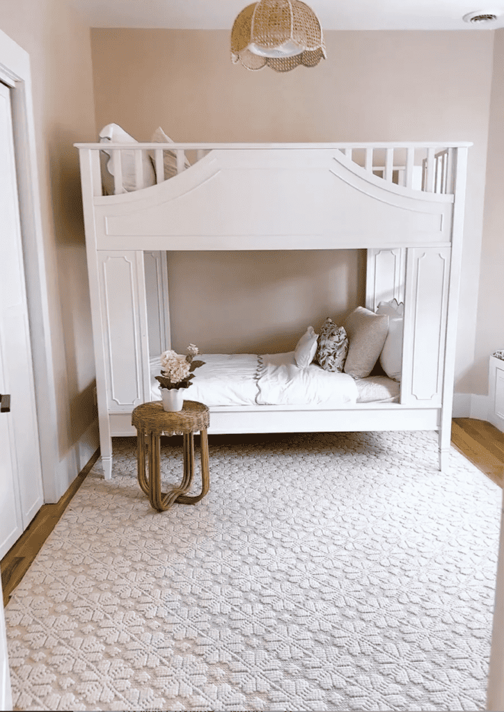 Little girl room with bunk bed and pink walls