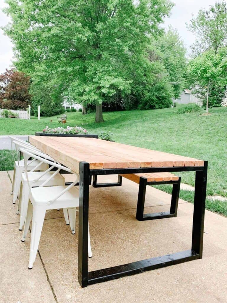 DIY outdoor table has the best kitchen table dimensions for a perfect table to gather around.