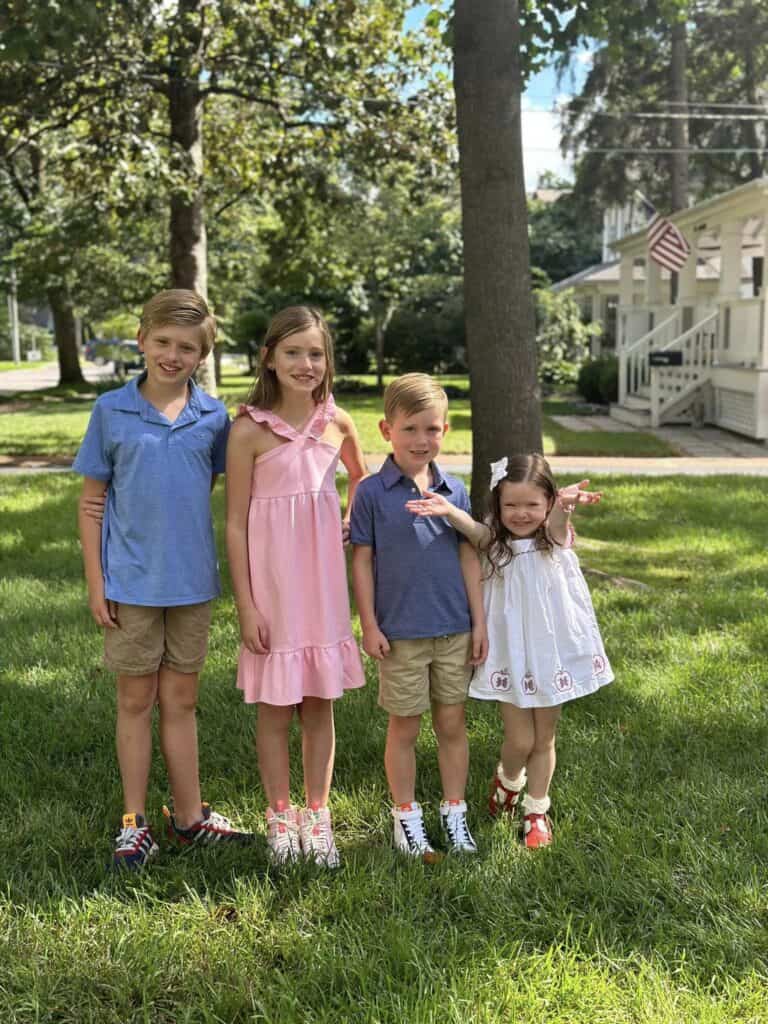 Four kids on first day of school.
