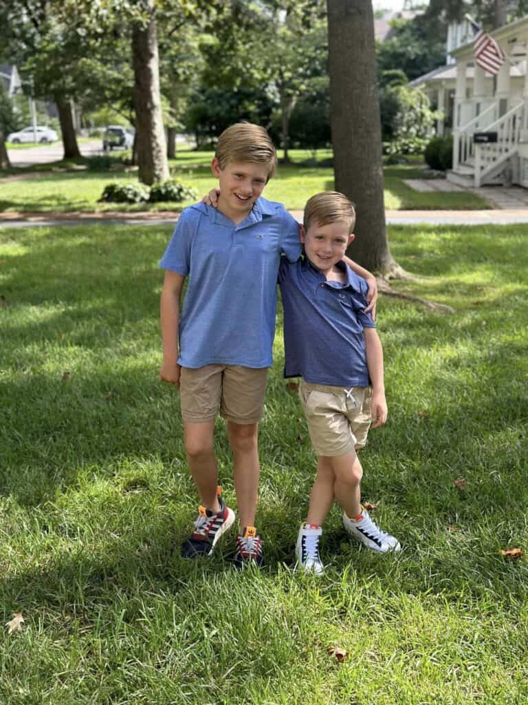 Two boys in blue polos