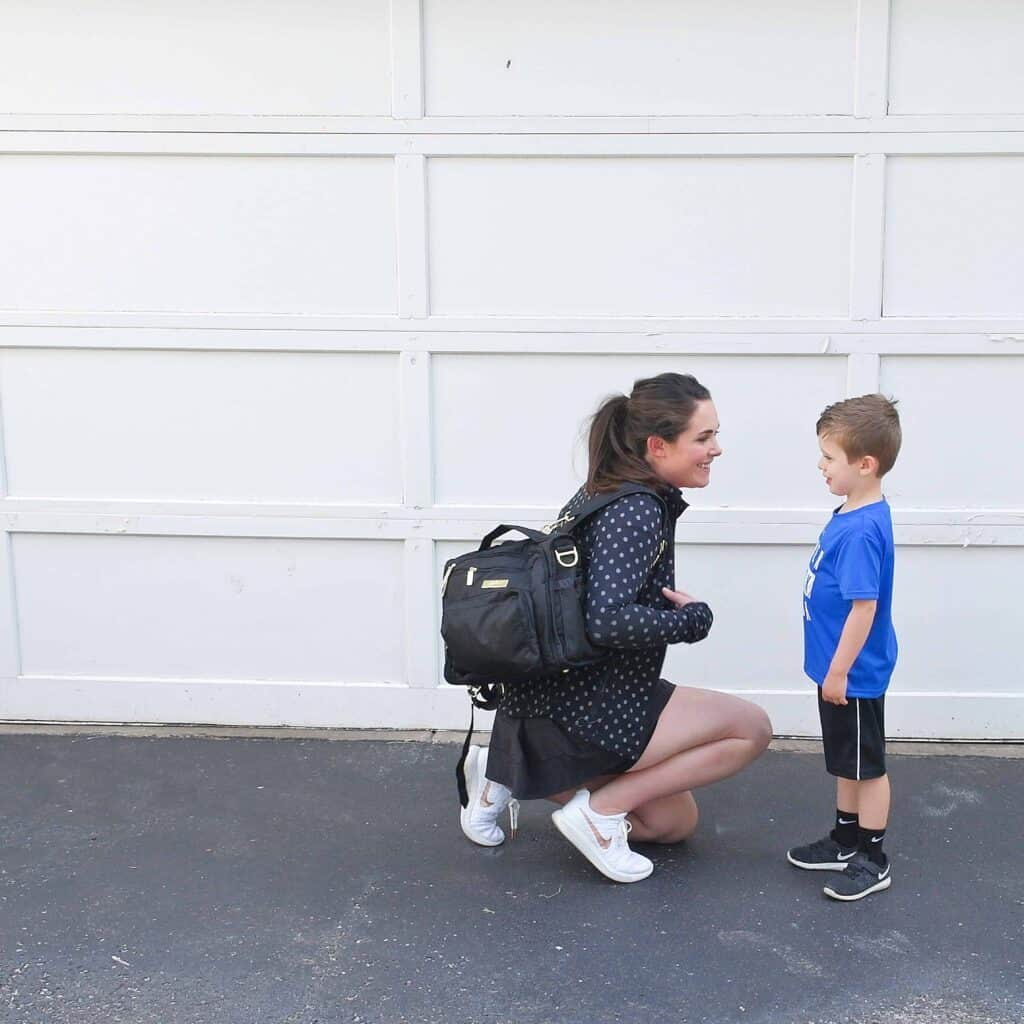 Best bags for moms will have a backpack on the list as seen here with little boy