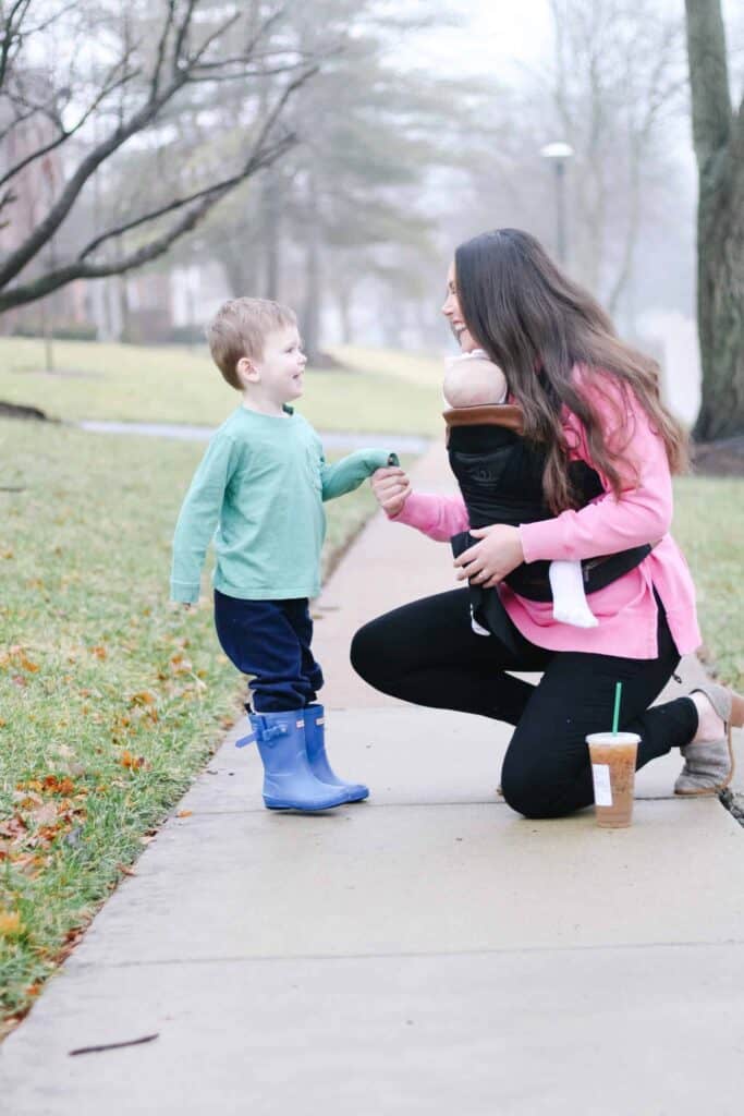 Little boy, Mom, and baby in baby carrier