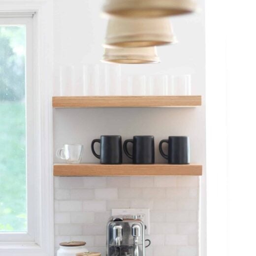 Coffee Station with open shelves and three champagne pendant kitchen lights