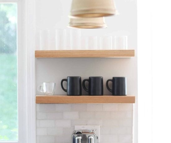 Coffee Station with open shelves and three champagne pendant kitchen lights
