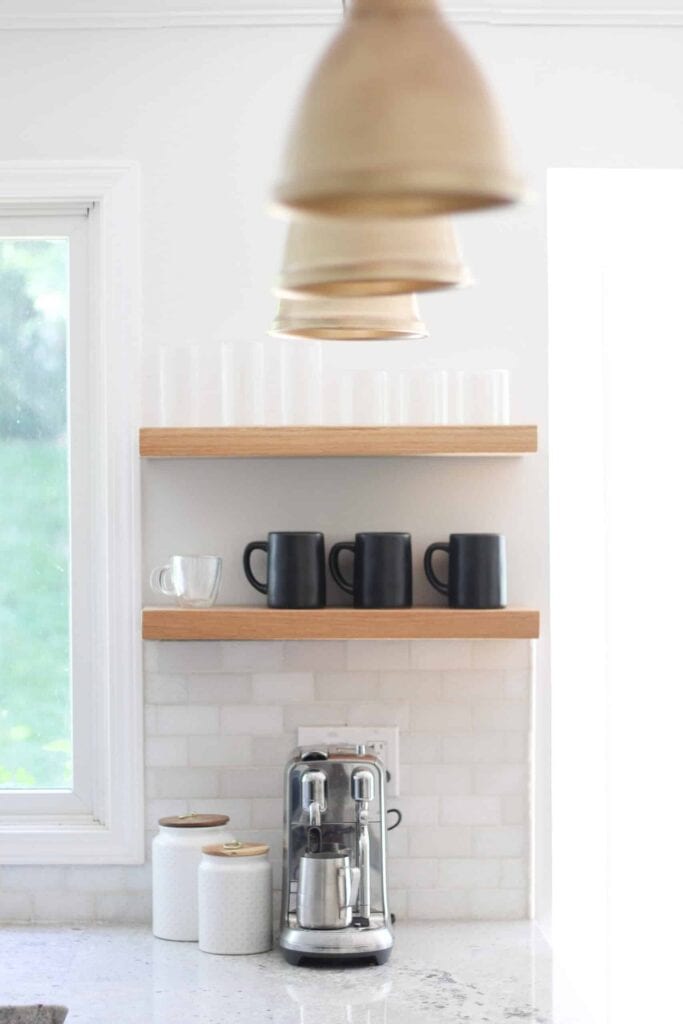 Coffee Station with open shelves and three champagne pendant kitchen lights