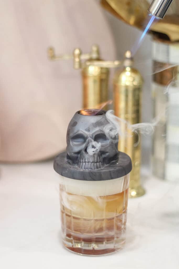 Halloween Coffee Recipes with a Coffee Old Fashion and skeleton cocktail smoker.
