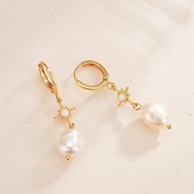 Pearl earring sizes range from dangling pearls to studs. Gold dangling pearls with sun details.