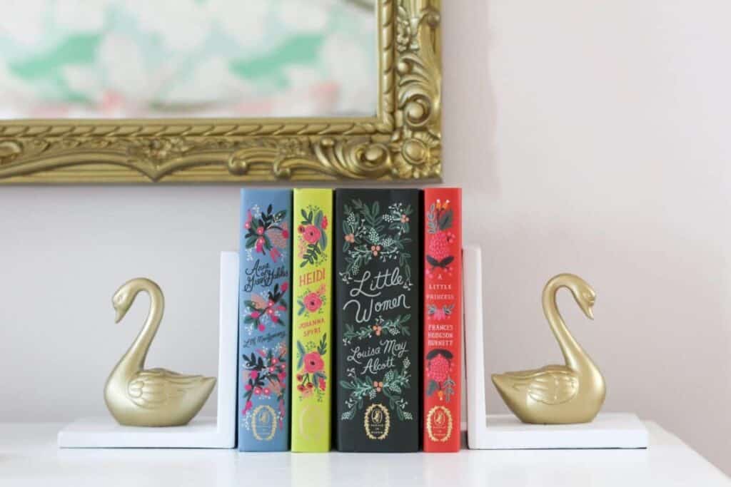 How much does it really cost to furnish a bedroom with gold antique swans and books.