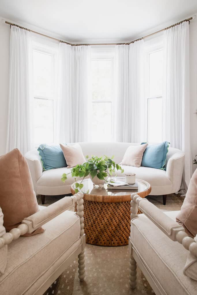 Hearth Room view with rounded couch 