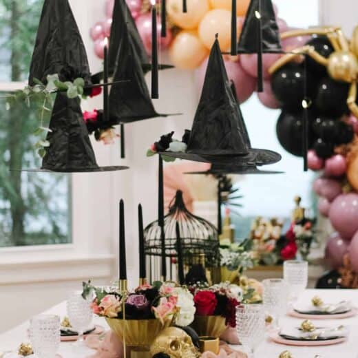DIY Halloween Decorations hanging witch hats.