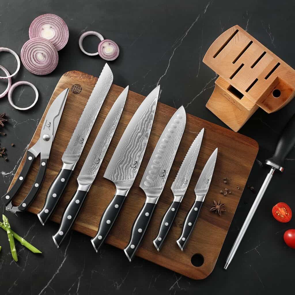 9 piece Damascus kitchen knife set on wooden cutting board