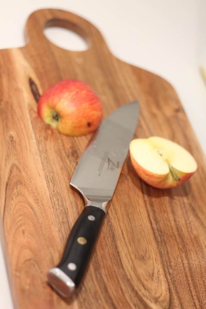 Damascus knife with apple