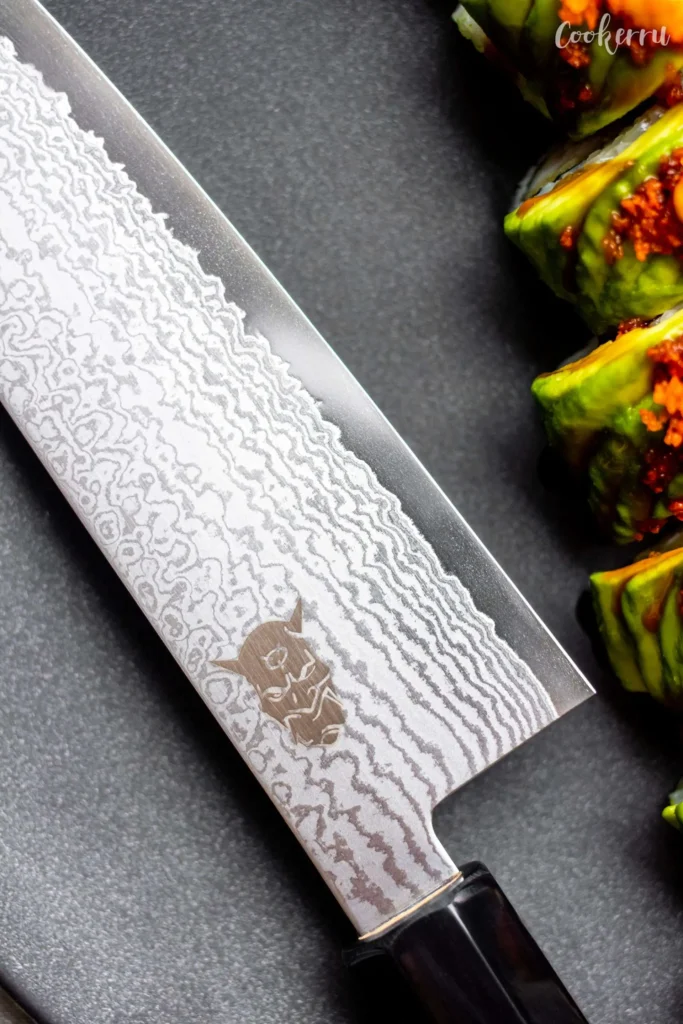 Best Damascus kitchen knife set with a close up next to sushi