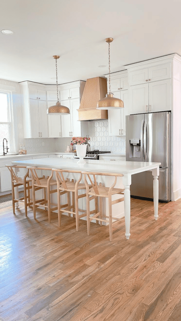 White kitchen island and white cabinets