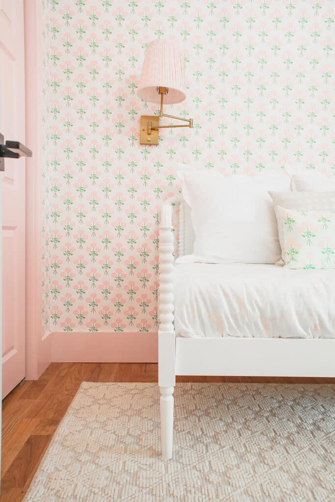 pink and green grand millennial wallpaper in toddler room.