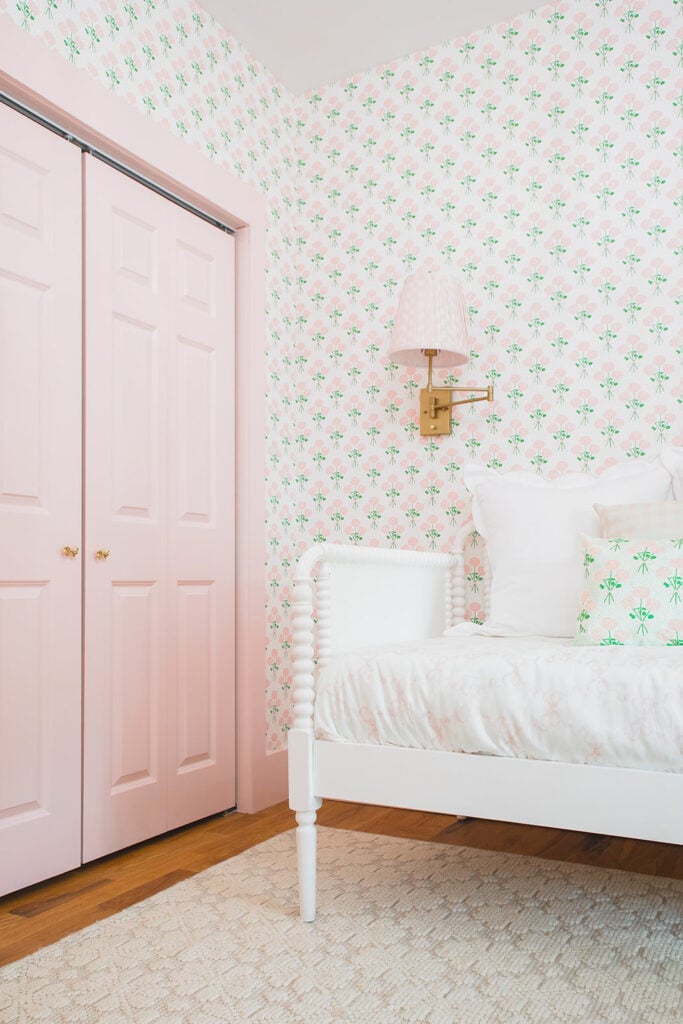 toddler girl room with pink trim and doors