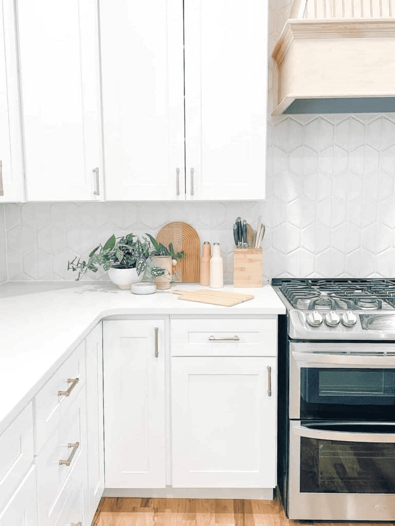 white kitchen cabinets with countertop decor